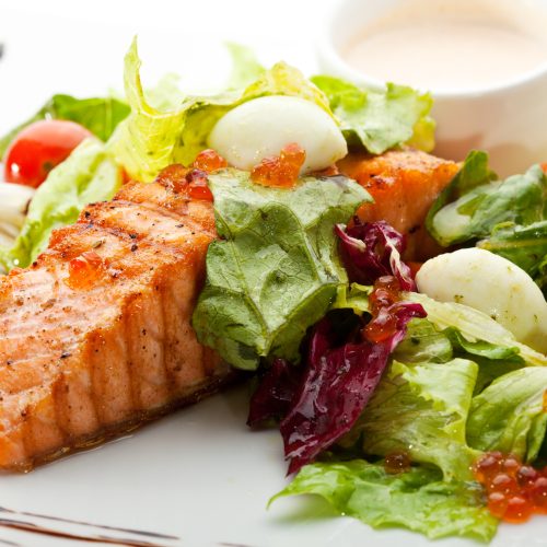 Grilled Salmon with Vegetables, Eggs and Sour Cream Sauce